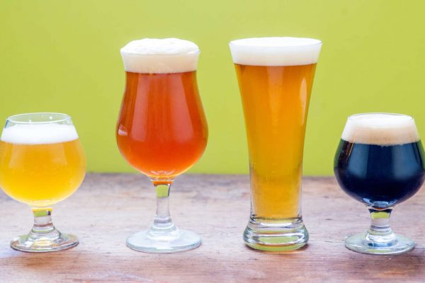 4 different beers in different-shaped glasses
