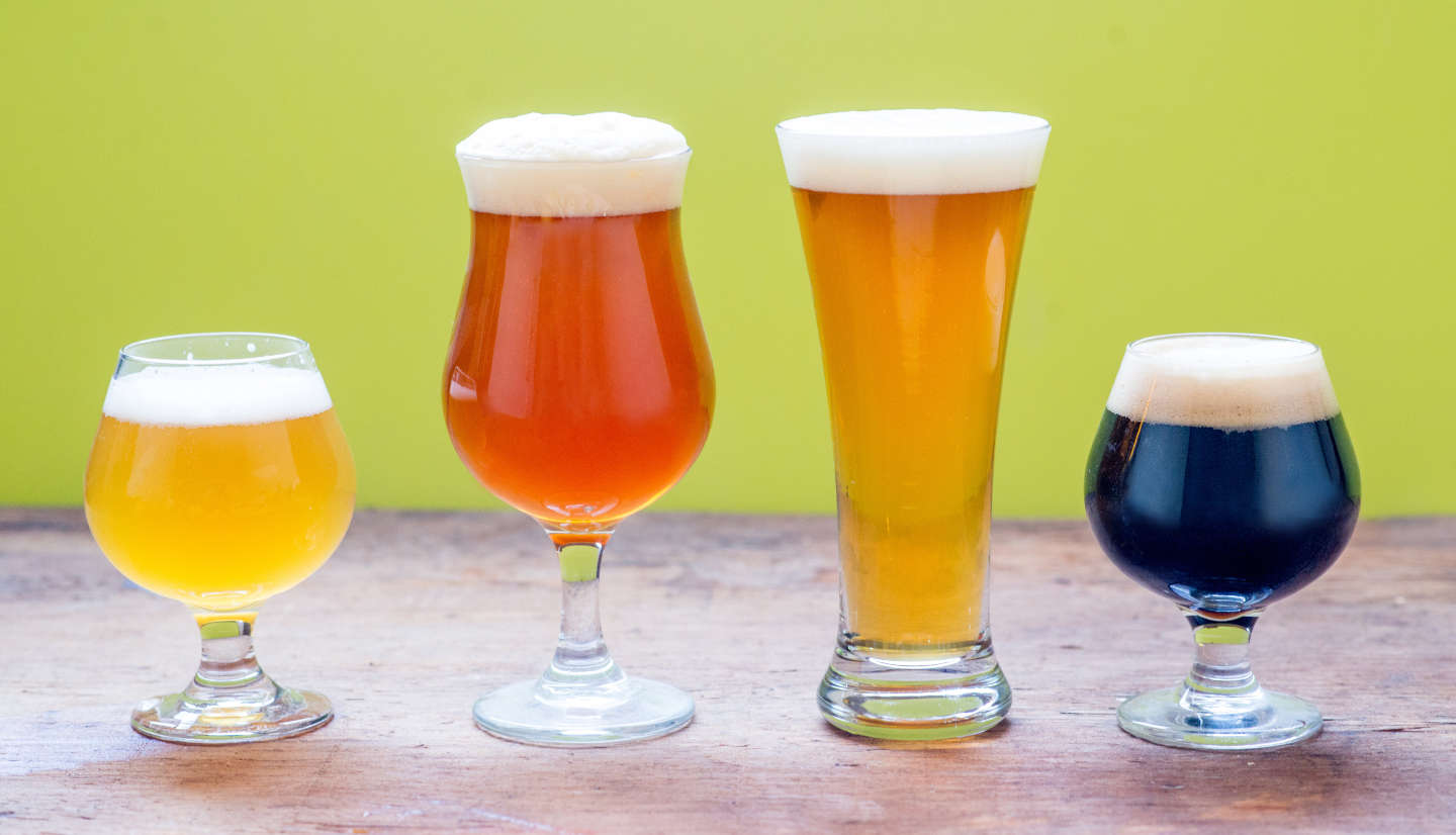 4 different beers in different-shaped glasses