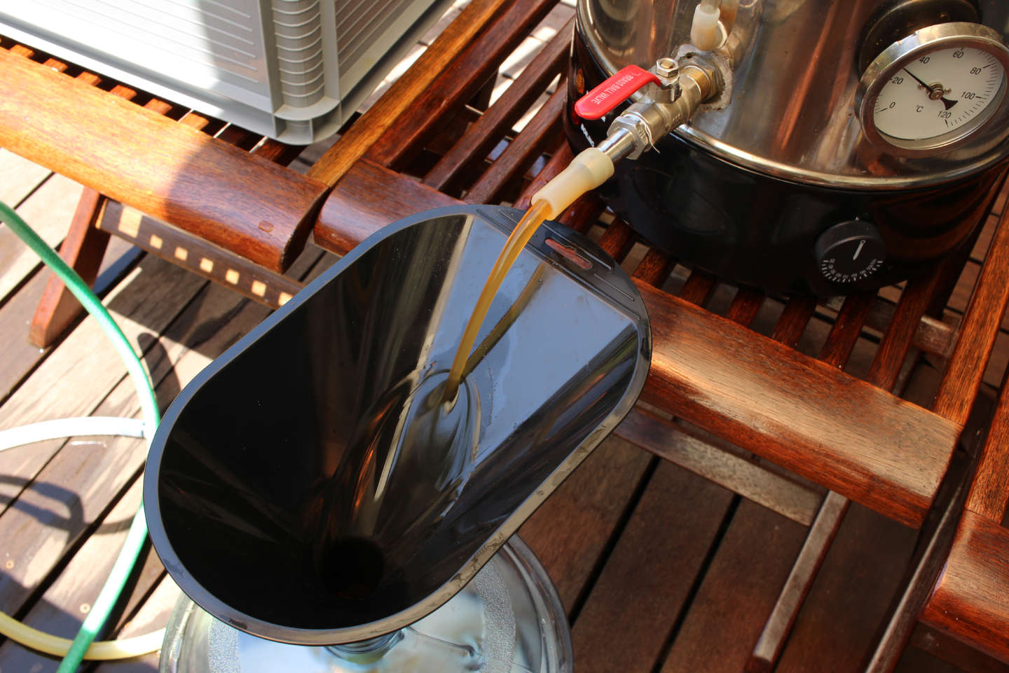 homebrew flowing out of a kettle