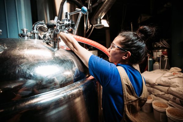 women-working-at-bright-tank-back-of-house-brewery