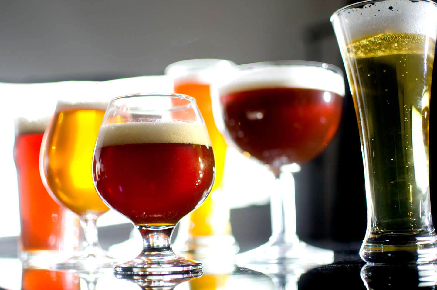 assorted beer styles in glassware