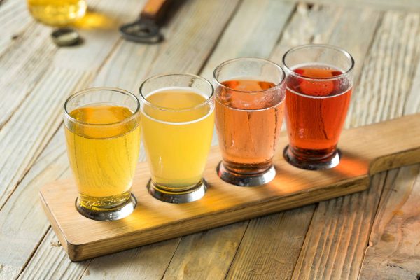 flight of different-colored ciders