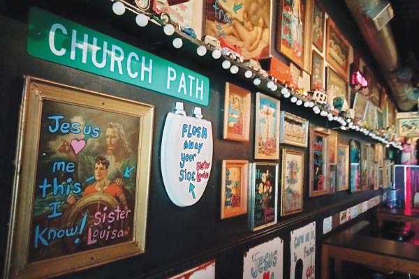 framed beer and church related pictures