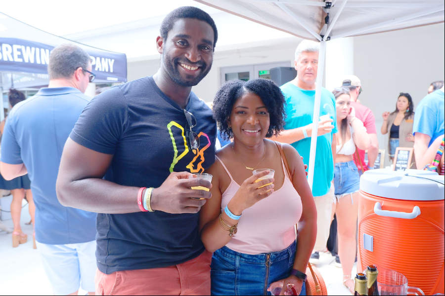 two beer drinkers at a festival