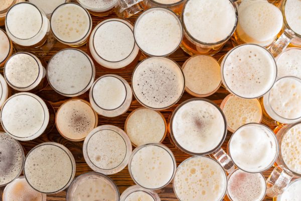 assorted beers on a bar top