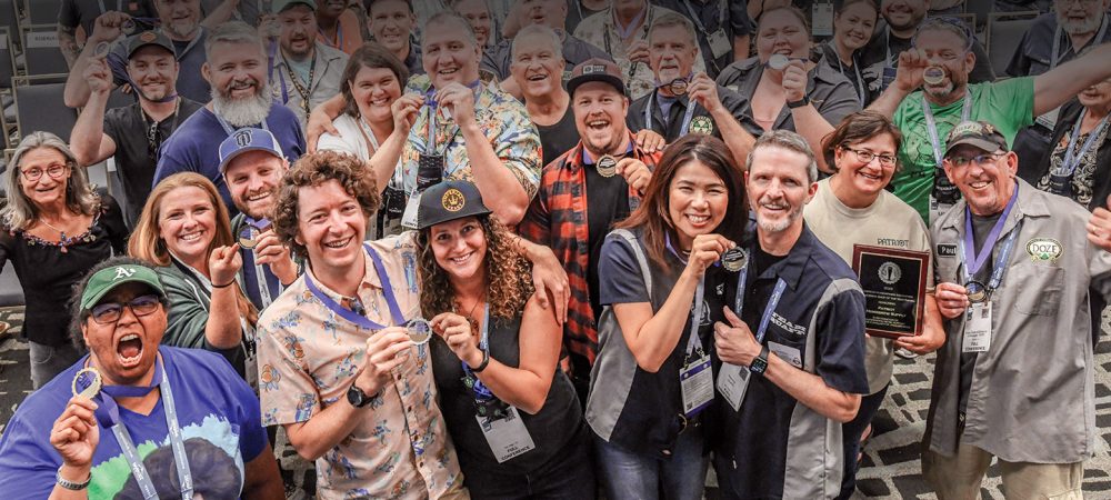 nhc winners grouped holding medals