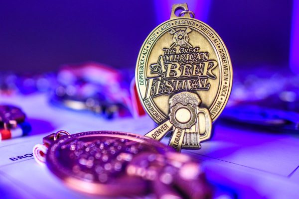 A gold and bronze GABF medal
